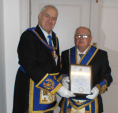 Andrew Whittle (left) presenting the certificate to Roy Smith. Andrew Whittle (left) presenting the certificate to Roy Smith.