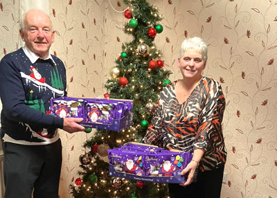 Joanne Gunn receiving selection boxes on behalf of BVH. Joanne Gunn receiving selection boxes on behalf of BVH.