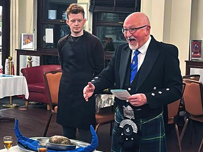 Mike Dutton passionately addressing the haggis. Mike Dutton passionately addressing the haggis.