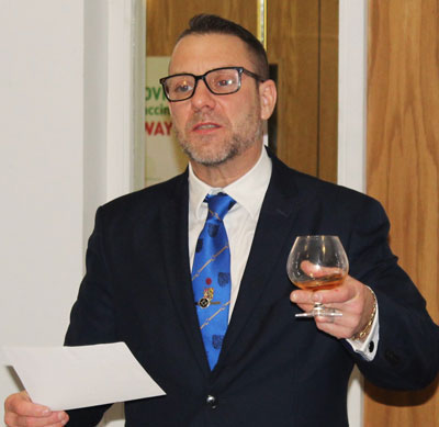 Neil Tottle toasting the founders of the lodge. Neil Tottle toasting the founders of the lodge.