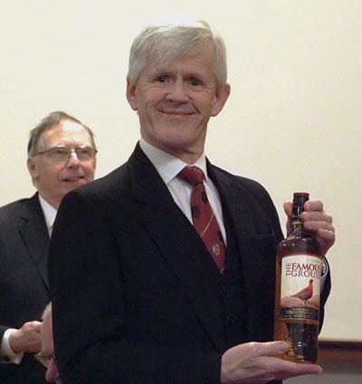 Ian Ward showing off his raffle prize with David Whyman in the background. Ian Ward showing off his raffle prize with David Whyman in the background.