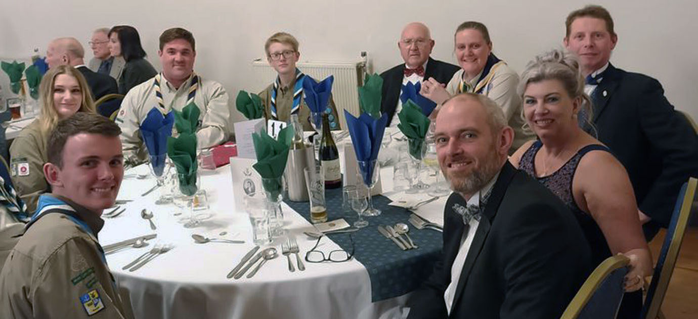 Martin Dennison (far right) sits with the Adventure Scouts at dinner. Martin Dennison (far right) sits with the Adventure Scouts at dinner.