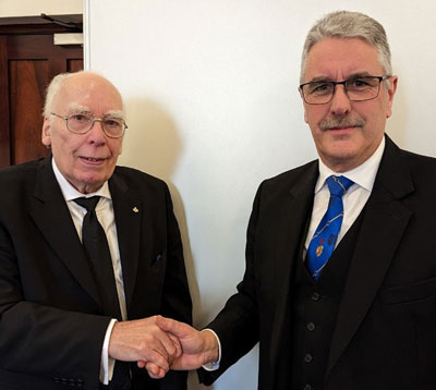 Andy Barton presents Nick Woods with his 50-year lapel pin badge to mark his milestone in Masonry. Andy Barton presents Nick Woods with his 50-year lapel pin badge to mark his milestone in Masonry.