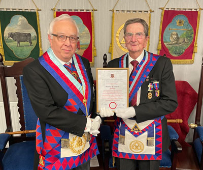 Malcolm Alexander (left) presents Stanley Fairhurst with his certificate. Malcolm Alexander (left) presents Stanley Fairhurst with his certificate.