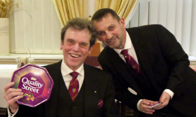 Michael Threlfall attempting to bribe David Thomas to smile for the camera. Michael Threlfall attempting to bribe David Thomas to smile for the camera.