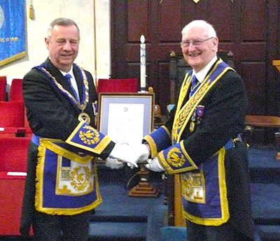 Peter (left) congratulates Ray. Peter (left) congratulates Ray.