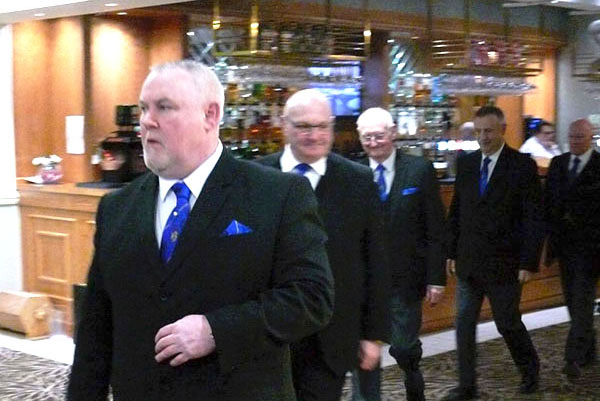 Ray (centre) parades into the festive board Ray (centre) parades into the festive board