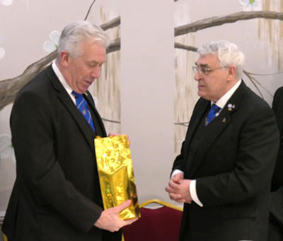 Mark gratefully receives a gift from the lodge. Mark gratefully receives a gift from the lodge.