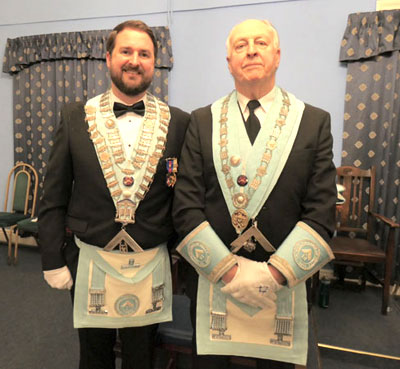 Installing master Michael Daly (left) with new WM Colin Skelland.