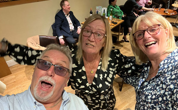 In the mood to party, from left to right, are: Andy Pope, Elaine Smith and Pat Pope.