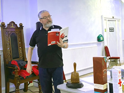 David Rigby welcomes everyone to the hall with a recital from Robbie Burns. David Rigby welcomes everyone to the hall with a recital from Robbie Burns.