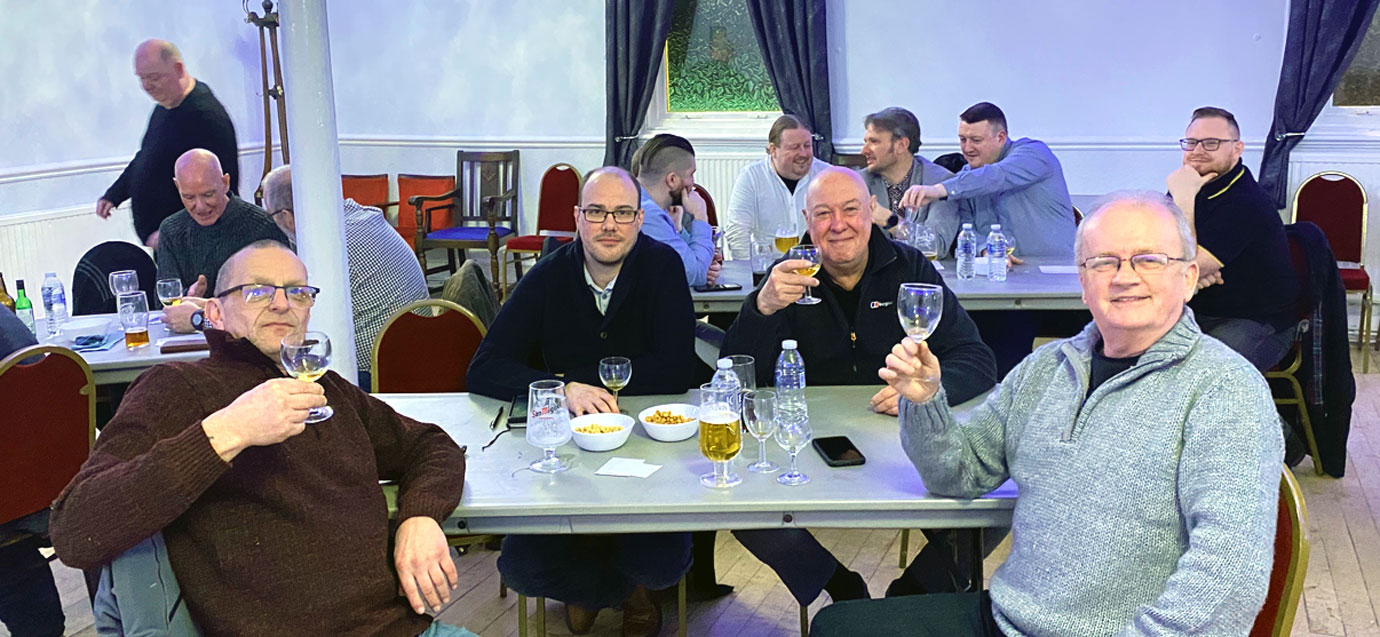 The guests enjoying the uisge beatha with Chris Maloney (front right). The guests enjoying the uisge beatha with Chris Maloney (front right).