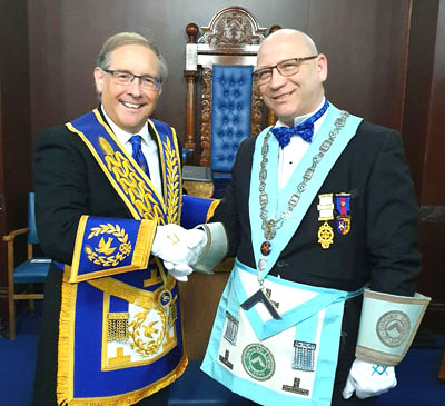Giles Berkley (left) congratulates Chris Hardingham. Giles Berkley (left) congratulates Chris Hardingham.