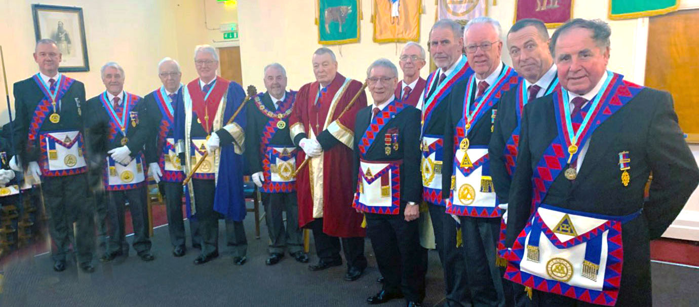Grand and acting Provincial grand officers with the three principals Grand and acting Provincial grand officers with the three principals