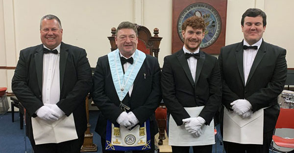 Pictured from left to right, are: David Collins, WM Peter McGrady and brothers Jakob and Joshua Collins.