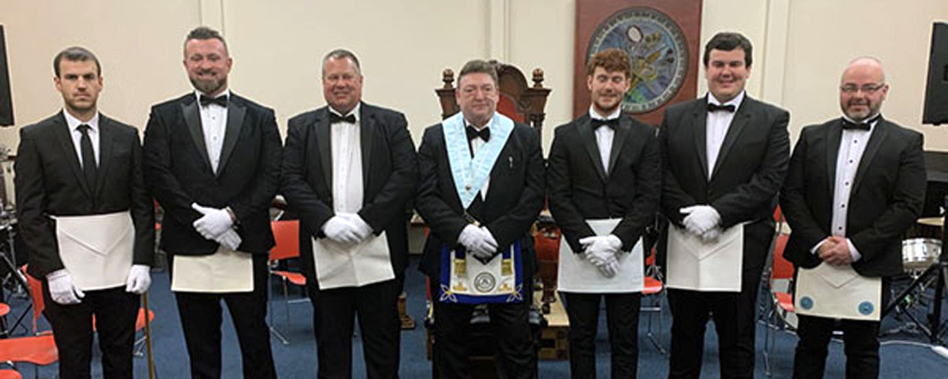 Peter McGrady (centre) with all the entered apprentices and a fellow craft of the lodge.