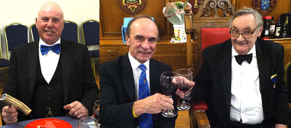 Pictured left: New senior warden Ian Hayes with his new-style gavel. Pictured right: Peter Taylor (left) taking wine with Mike Casey. 