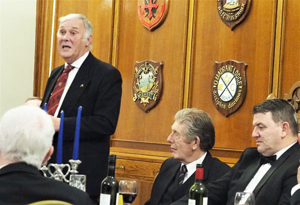 Roger Perry (standing) speaking at the festive board with John Hayfield (centre) and Jason Emsley (right) looking on. Roger Perry (standing) speaking at the festive board with John Hayfield (centre) and Jason Emsley (right) looking on.