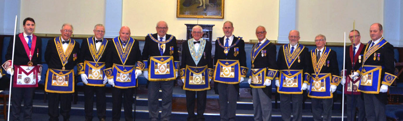 Bryan flanked by grand and Provincial grand officers. Bryan flanked by grand and Provincial grand officers.