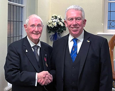 Mark Matthews (right) welcomes George Wilkie to Southport Masonic Hall.