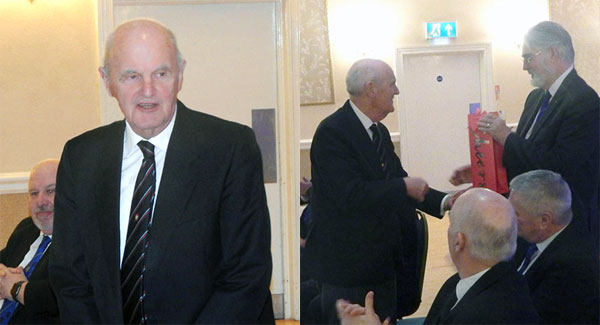 Pictured left: Ken responds to his toast. Pictured right: Steve Williams (right) presents a gift to Ken. Pictured left: Ken responds to his toast. Pictured right: Steve Williams (right) presents a gift to Ken.