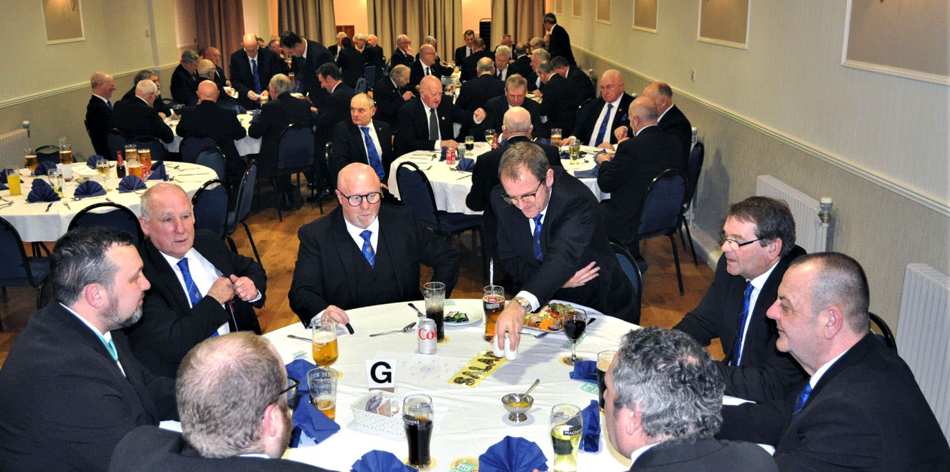The brethren seated ready for the banquet. The brethren seated ready for the banquet.