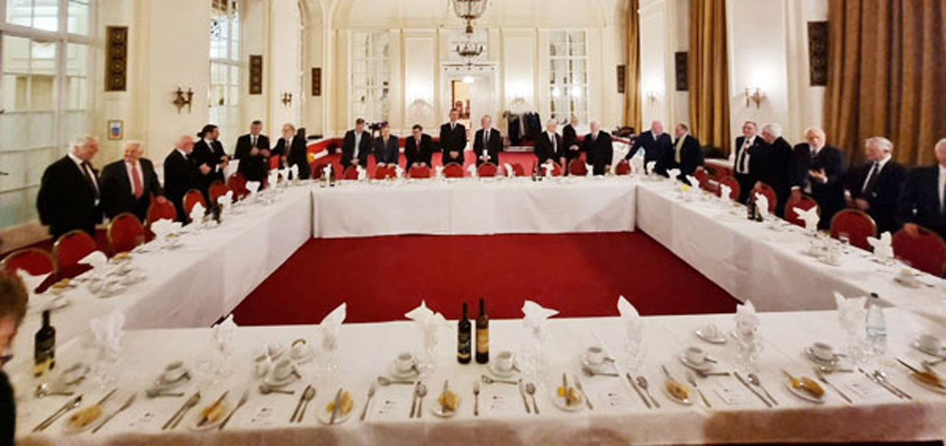Guests and companions gather for the festive board. Guests and companions gather for the festive board.