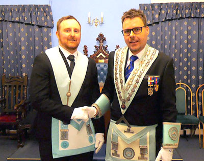 Andrew Sharkey (left) being congratulated by WM Andrew Prowse. Andrew Sharkey (left) being congratulated by WM Andrew Prowse.