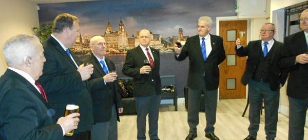 Pictured from left to right, are: Les Brooks, Jim Gwyther, Graeme Jones, William Wenton and Paul Jones Andy (third right) at drinks reception congratulating Graeme (second left) and the installation team