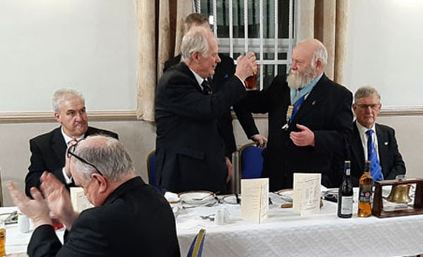 At the festive board Graham (left) receives the toast from the WM.