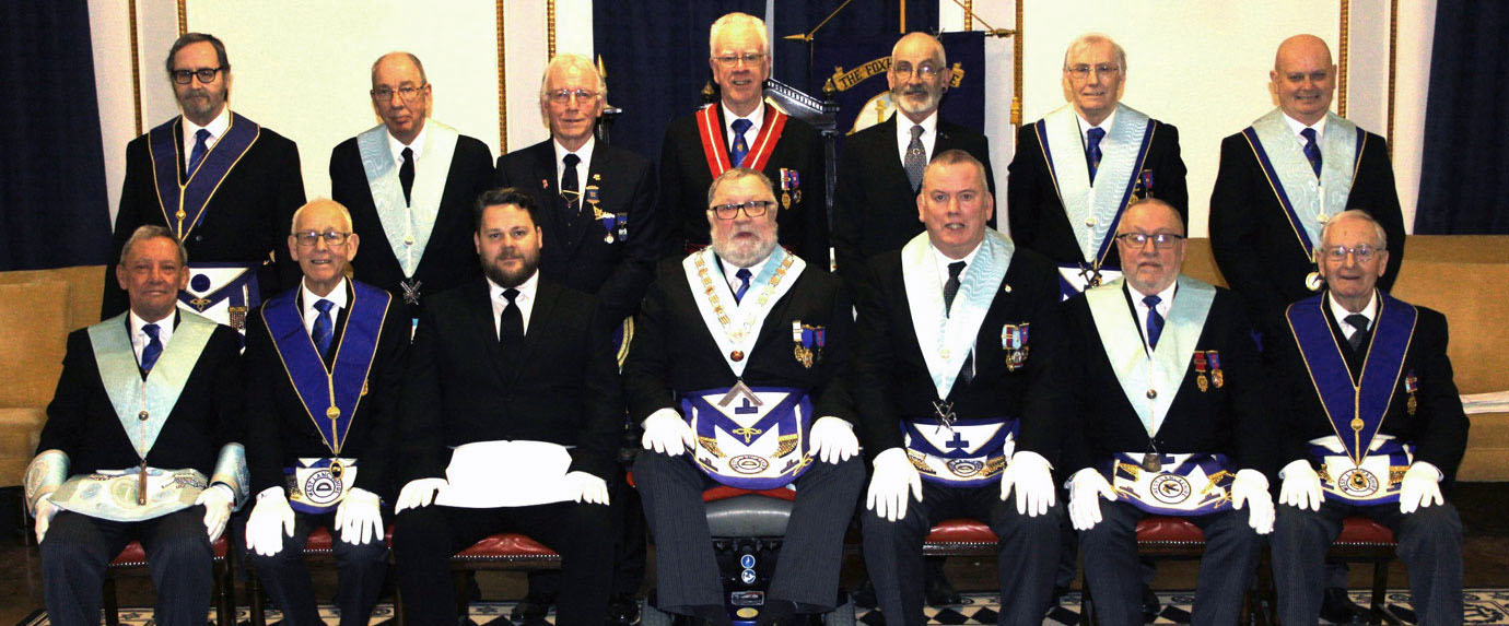Roy Sibley (centre) surrounded by members of Foxhall Lodge. Roy Sibley (centre) surrounded by members of Foxhall Lodge.