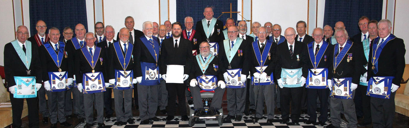Roy Sibley (centre) surrounded by members and guests of Foxhall Lodge. Roy Sibley (centre) surrounded by members and guests of Foxhall Lodge.