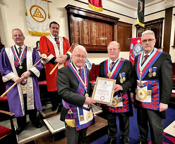 Pictured from left to right, as Colin presents Eric with his certificate, are: Mike Williams, Darren Brown, Eric Drinkwater, Colin Rowling and Andy Barton. Pictured from left to right, as Colin presents Eric with his certificate, are: Mike Williams, Darren Brown, Eric Drinkwater, Colin Rowling and Andy Barton.