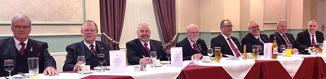 Companions on the top table enjoying the meal. Companions on the top table enjoying the meal.