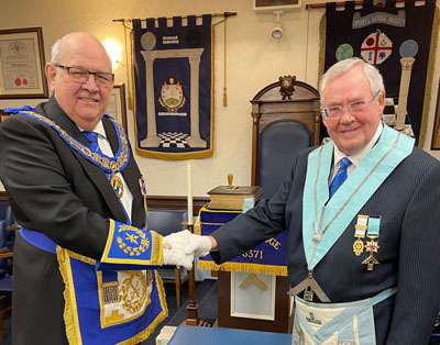 Philip Gunning (left) congratulating Ernie Barrow. Philip Gunning (left) congratulating Ernie Barrow.