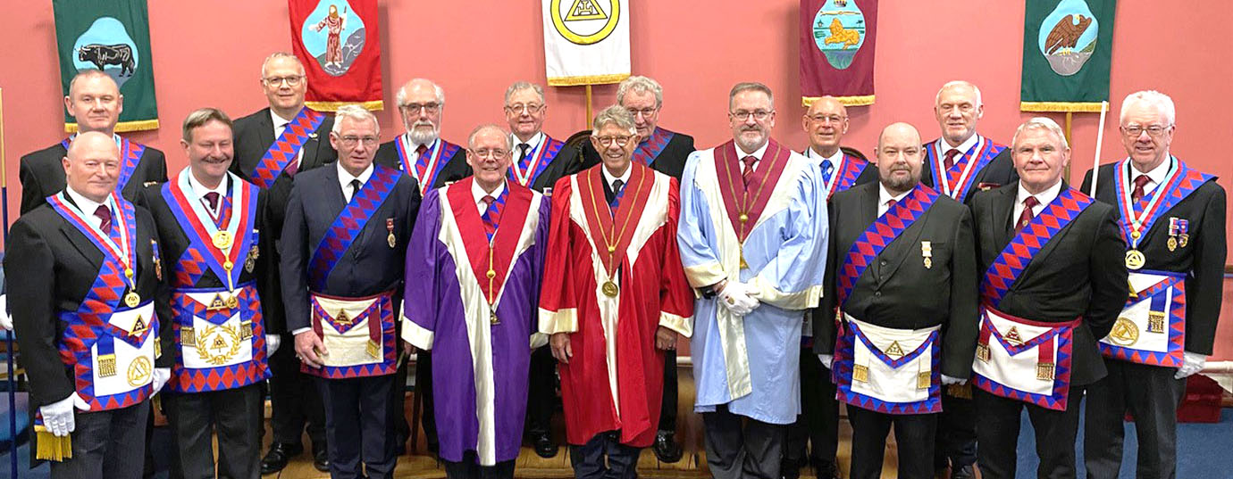 Paul Hesketh (second left) with the three principals, from left to right in the centre, are: Ian Cuerden, Peter Booth and Nick Medway, along with the Penwortham Chapter members.