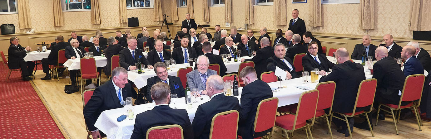 Visiting brethren and non-Masonic guests enjoy the social board. Visiting brethren and non-Masonic guests enjoy the social board.