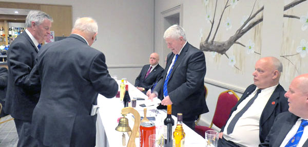 Arthur receives gifts from the lodge. Arthur receives gifts from the lodge.
