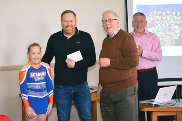 Pictured from left to right, are: Piper Smith, Ben Smith, Alan Patterson presenting the cheque and Bob Williams. Pictured from left to right, are: Piper Smith, Ben Smith, Alan Patterson presenting the cheque and Bob Williams.