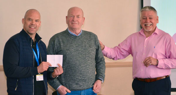 Pictured from left to right, are: David King receiving a cheque from Paul Smith and Bob Williams.