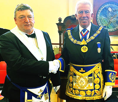 Peter McGrady (left) being congratulated by Mark Matthews. Peter McGrady (left) being congratulated by Mark Matthews.