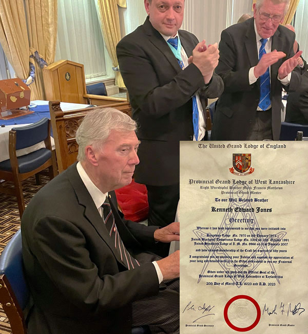 Ken Jones (seated) receives a standing ovation. Inset: Ken’s 50th certificate. Ken Jones (seated) receives a standing ovation. Inset: Ken’s 50th certificate.