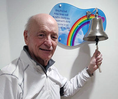Brian Sharples ringing the ‘all clear’ bell.