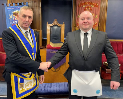 WM David Robinson (left) congratulating Stuart McGrath.