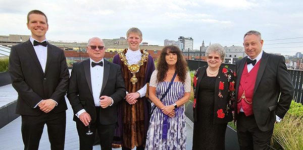 Pictured from left to right, are: Hugo Labat, Cliff Jones, Neil Darby, Denise Hartley, Angela Seed and David Parker Snr.