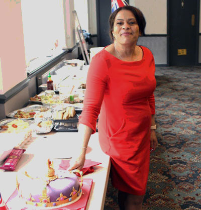 Charlene cutting the cake. Charlene cutting the cake.