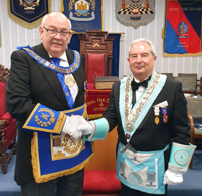 Philip Gunning (left) congratulates Martin Poole on being installed into the chair of Royal Oak Lodge.