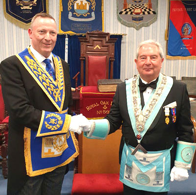 Jason Dell (left) congratulates his friend Martin Poole. 