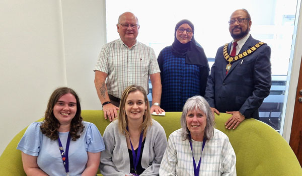 Cliff Jones (back row left) with the Mayor of Preston Yakub Patel and the Preston Domestic Violence Service Team.