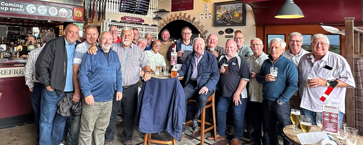 The sponsors gather before travelling to the match